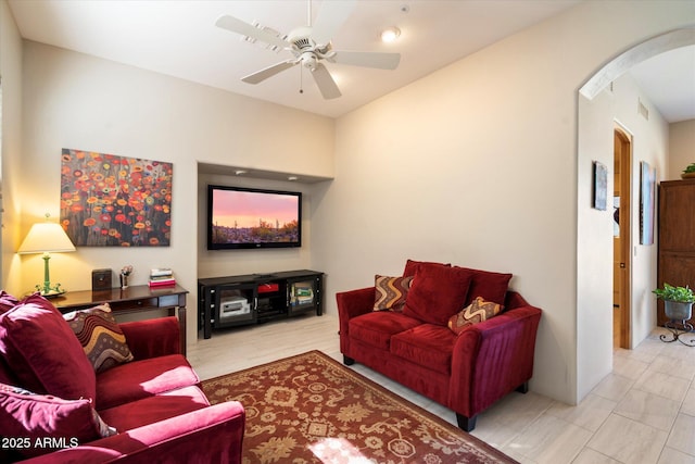 living room featuring ceiling fan