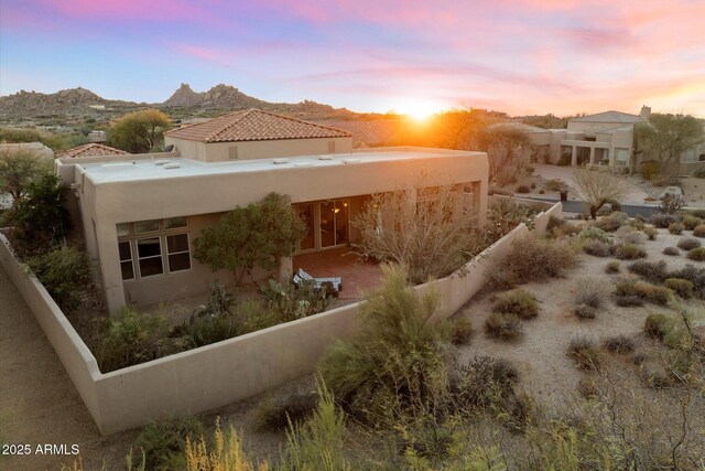 exterior space featuring a mountain view