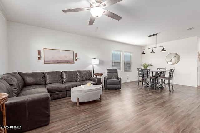 5875 N 195th Dr, Litchfield Park, AZ 85340 - living area with a ceiling fan, baseboards, visible vents, and wood finished floors