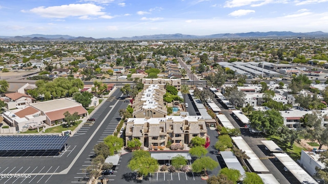 drone / aerial view with a residential view and a mountain view