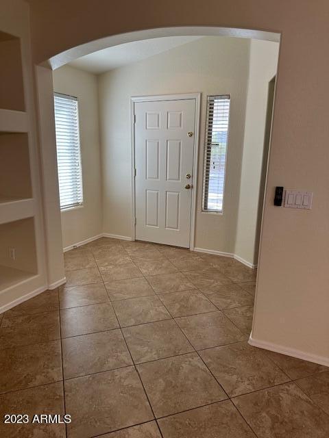 view of tiled foyer entrance