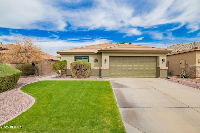 view of front facade with concrete driveway, stucco siding, a tile roof, an attached garage, and a front yard