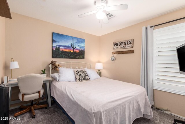 bedroom with ceiling fan and carpet