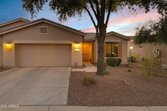 view of front of property featuring a garage