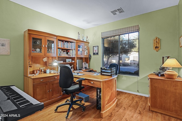 home office featuring light wood-type flooring