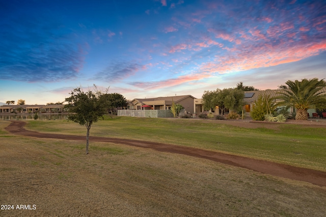 view of home's community featuring a yard