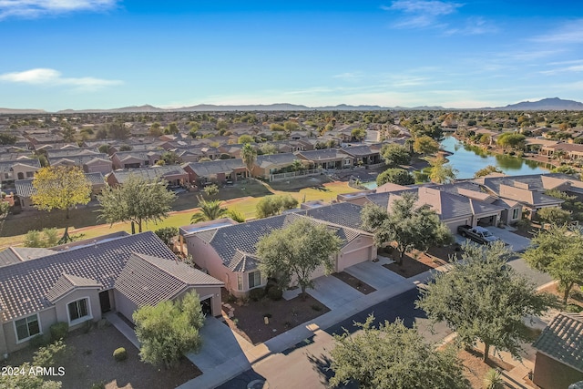 bird's eye view featuring a water and mountain view