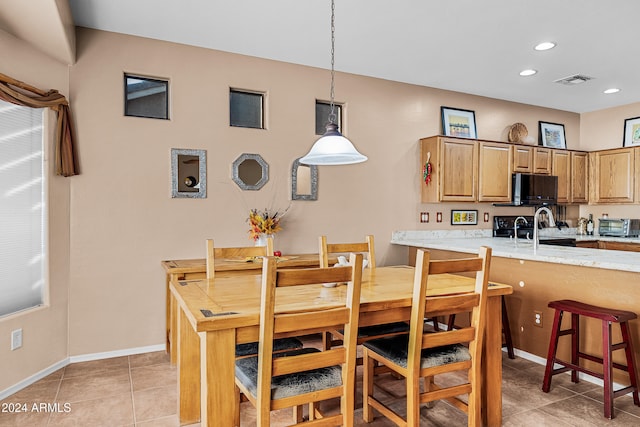 view of tiled dining space