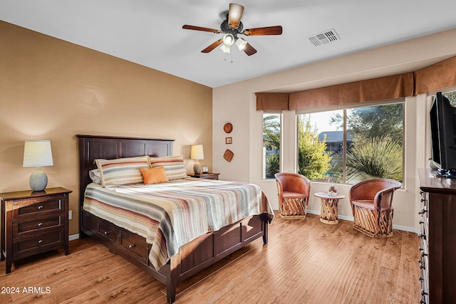 bedroom featuring ceiling fan and light wood-type flooring