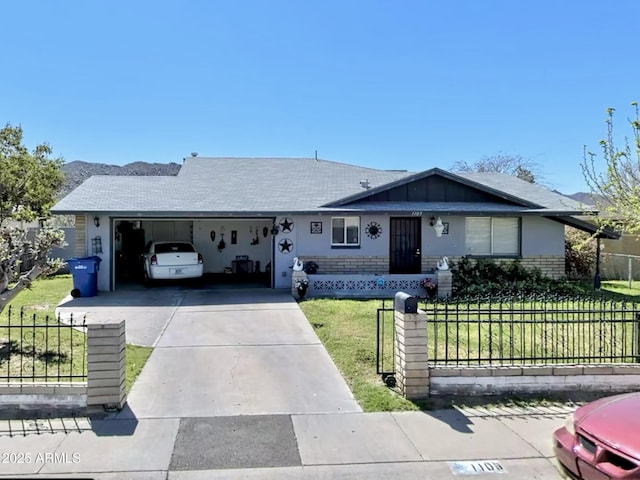 ranch-style home with a garage and a front yard