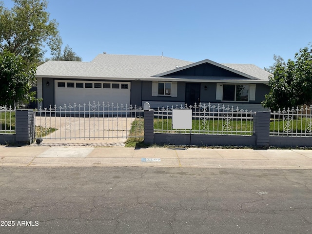 single story home featuring driveway, a fenced front yard, a shingled roof, and a garage
