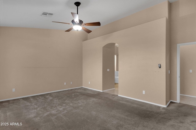 empty room featuring ceiling fan and carpet flooring