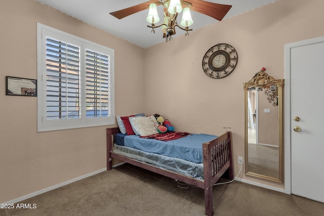 bedroom featuring ceiling fan and carpet floors