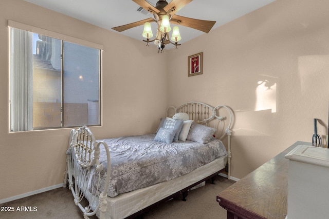 bedroom featuring ceiling fan and carpet flooring