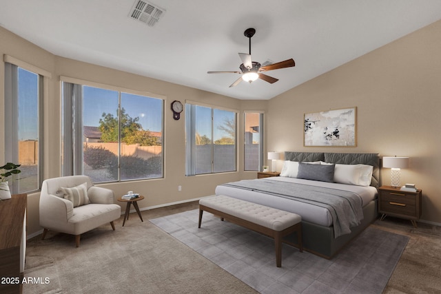 bedroom featuring lofted ceiling, carpet flooring, and ceiling fan