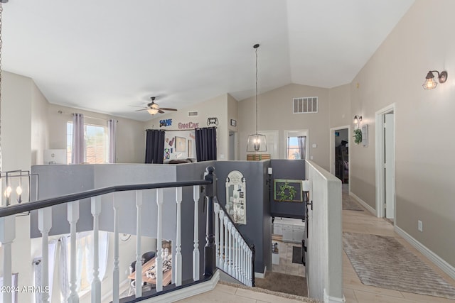 hallway with vaulted ceiling