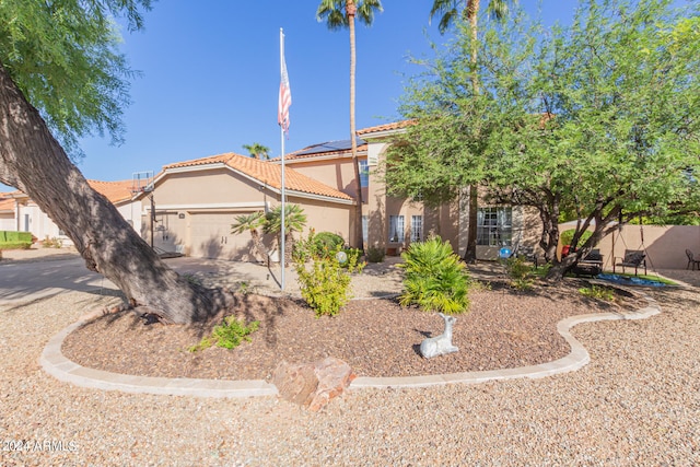 view of front of home with a garage