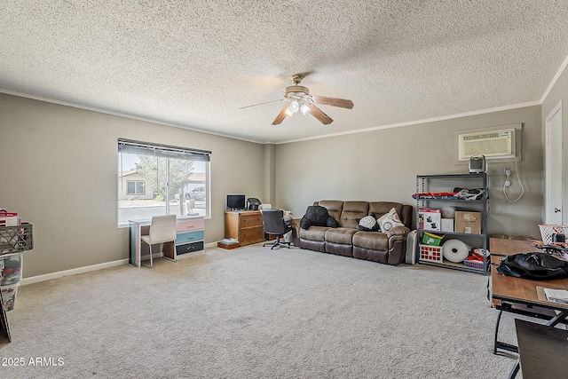 living area featuring ceiling fan, a wall mounted AC, carpet floors, ornamental molding, and a textured ceiling