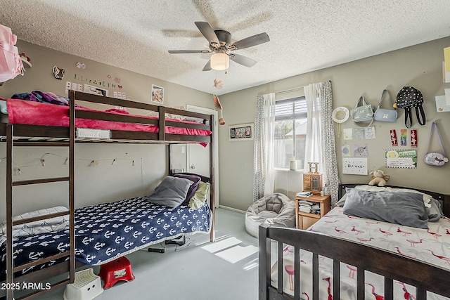 bedroom featuring a textured ceiling, a ceiling fan, and concrete floors
