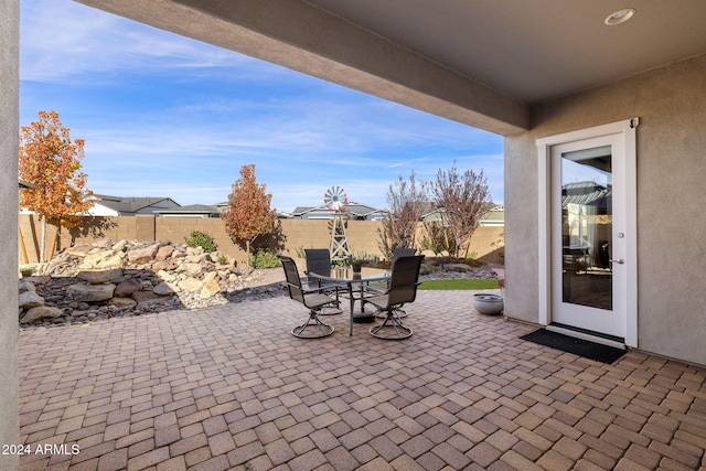 view of patio / terrace with a fenced backyard and outdoor dining area