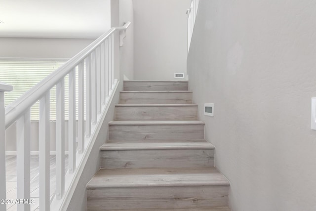 stairs featuring visible vents