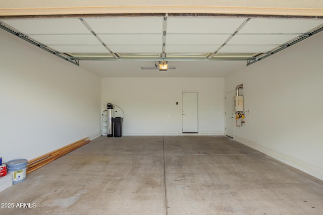 garage featuring baseboards and a garage door opener