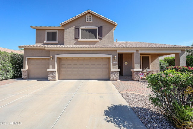 2886 E Hazeltine Way, Chandler, AZ 85249 - view of front facade with a garage, driveway, stone siding, and stucco siding