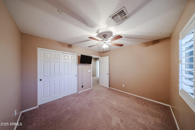 2886 E Hazeltine Way, Chandler, AZ 85249 - unfurnished bedroom with visible vents, baseboards, a closet, and light carpet