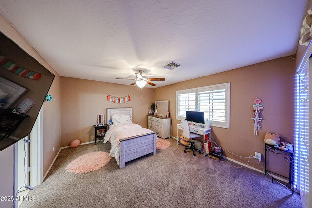 2886 E Hazeltine Way, Chandler, AZ 85249 - carpeted bedroom with baseboards, ceiling fan, and visible vents