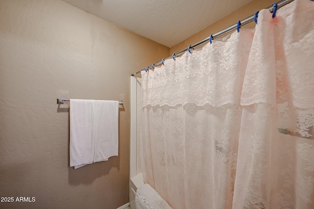 2886 E Hazeltine Way, Chandler, AZ 85249 - bathroom with baseboards, a textured ceiling, and a shower with curtain