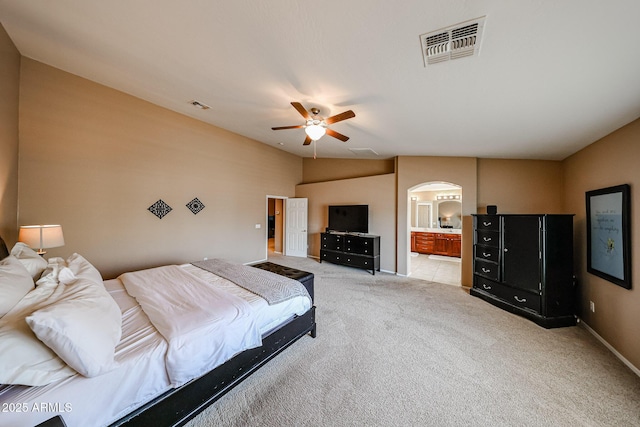 2886 E Hazeltine Way, Chandler, AZ 85249 - bedroom featuring carpet floors, arched walkways, visible vents, and ensuite bath