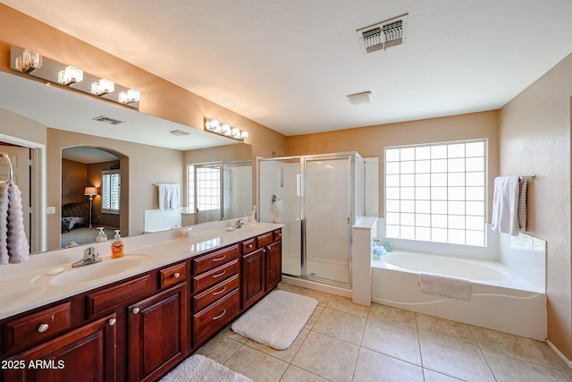 2886 E Hazeltine Way, Chandler, AZ 85249 - ensuite bathroom with double vanity, visible vents, a sink, and ensuite bath