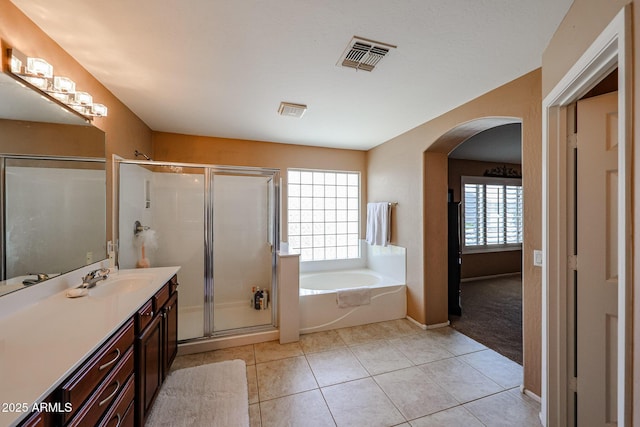 2886 E Hazeltine Way, Chandler, AZ 85249 - full bath with tile patterned flooring, vanity, visible vents, a garden tub, and a stall shower