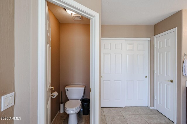 2886 E Hazeltine Way, Chandler, AZ 85249 - bathroom with tile patterned floors, toilet, and visible vents