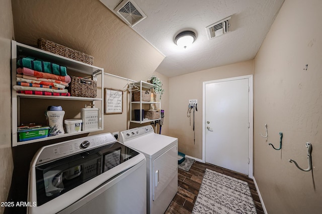 2886 E Hazeltine Way, Chandler, AZ 85249 - laundry area featuring separate washer and dryer, laundry area, dark wood-type flooring, and visible vents