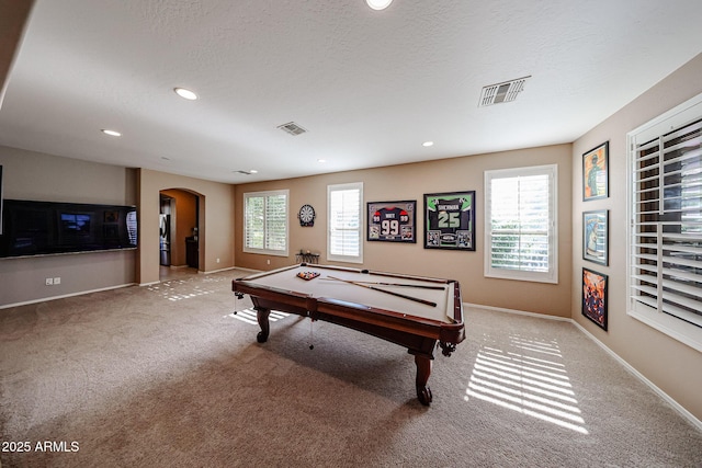 2886 E Hazeltine Way, Chandler, AZ 85249 - rec room with carpet floors, arched walkways, and visible vents