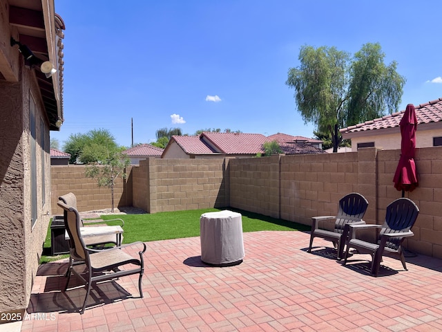 6049 S Wilson Dr, Chandler, AZ 85249 - fenced backyard featuring a patio