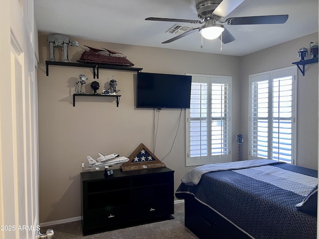 6049 S Wilson Dr, Chandler, AZ 85249 - bedroom with carpet flooring, ceiling fan, and baseboards