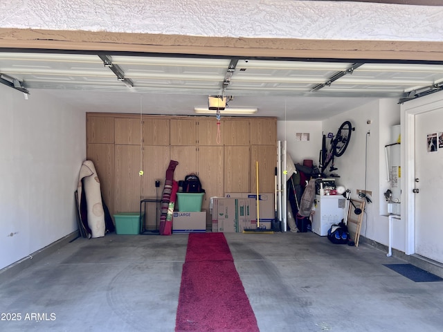 6049 S Wilson Dr, Chandler, AZ 85249 - garage with a garage door opener and gas water heater