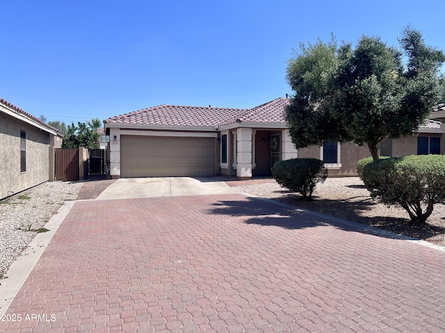 6049 S Wilson Dr, Chandler, AZ 85249 - single story home with stucco siding, a tiled roof, a garage, and driveway