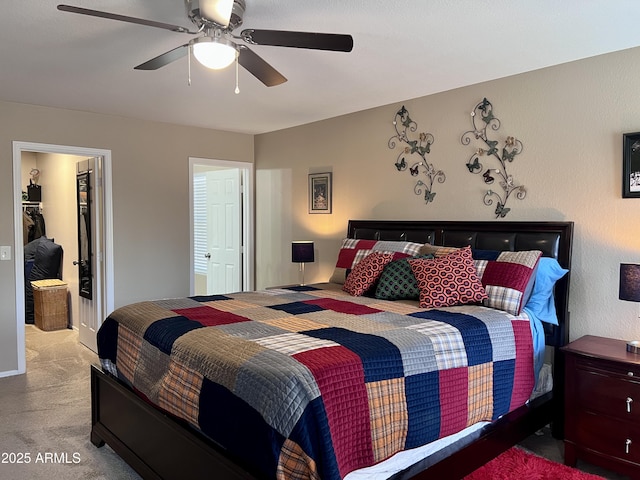 6049 S Wilson Dr, Chandler, AZ 85249 - bedroom featuring carpet, a spacious closet, a closet, and ceiling fan