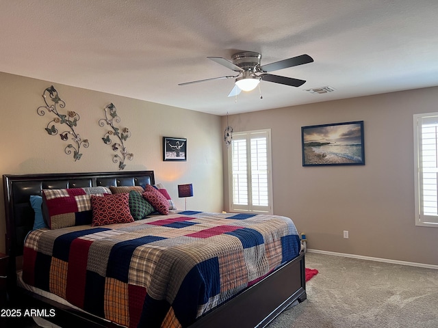 6049 S Wilson Dr, Chandler, AZ 85249 - carpeted bedroom featuring baseboards and a ceiling fan