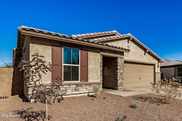 view of front of property featuring a garage