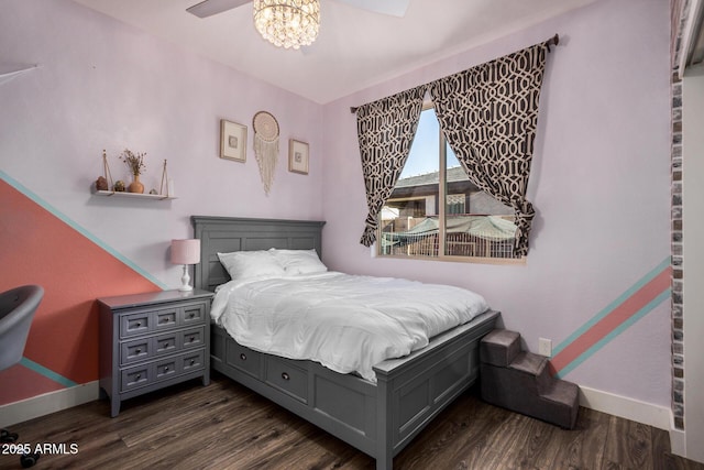 bedroom featuring dark wood-type flooring and ceiling fan