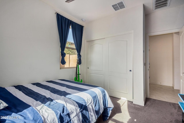 bedroom featuring a closet and carpet