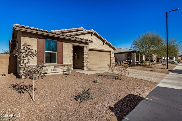 view of front of property featuring a garage