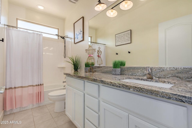 full bathroom with toilet, vanity, tile patterned flooring, and shower / bath combo with shower curtain