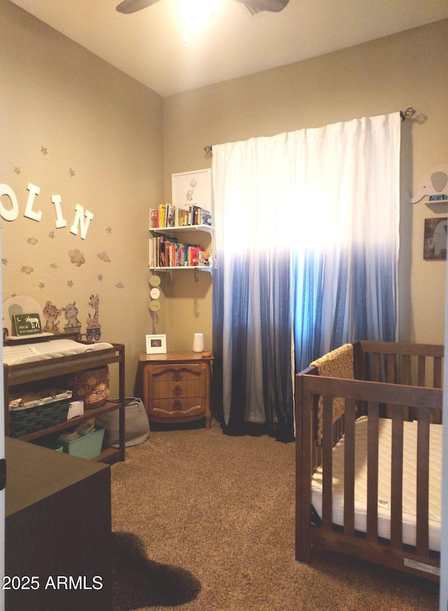 bedroom featuring a ceiling fan and carpet floors
