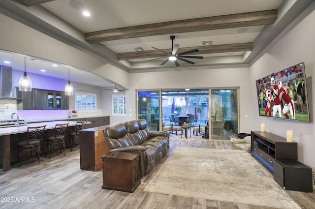 18175 W Highland Ave, Goodyear, AZ 85395 - living room with visible vents, beamed ceiling, light wood-style floors, recessed lighting, and a ceiling fan