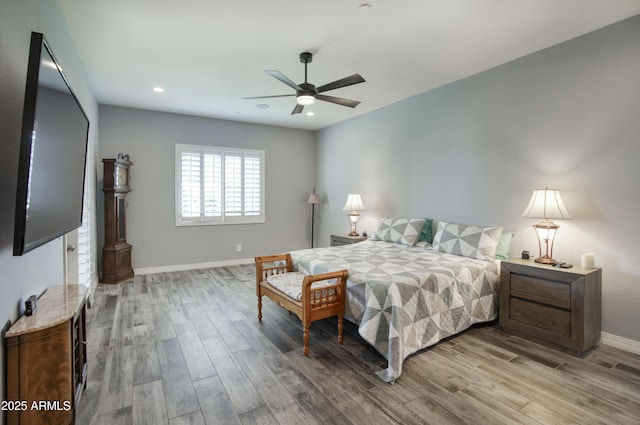 18175 W Highland Ave, Goodyear, AZ 85395 - bedroom with recessed lighting, baseboards, a ceiling fan, and wood finished floors
